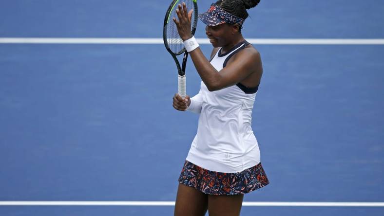 Venus Williams celebrates after her win against Kiki Bertens at the Lindner Family Tennis Center in Mason, Ohio, on Tuesday, Aug. 13, 2019. Williams won in three sets, 6-3, 3-6, 7-4.