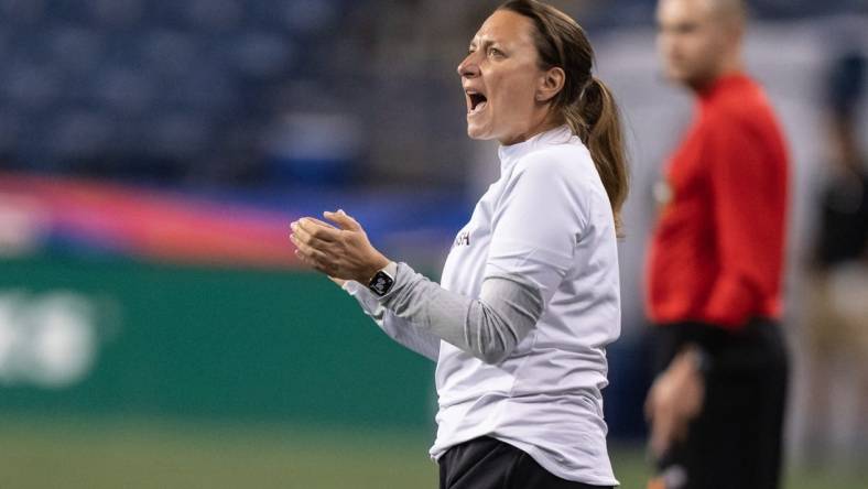 May 3, 2023; Seattle, Washington, USA; Angel City FC head coach Freya Coombe yells to her team during a match against OL Reign at Lumen Field. Mandatory Credit: Stephen Brashear-USA TODAY Sports