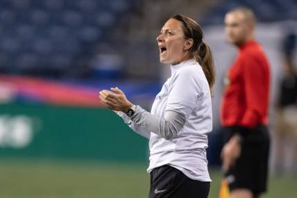 May 3, 2023; Seattle, Washington, USA; Angel City FC head coach Freya Coombe yells to her team during a match against OL Reign at Lumen Field. Mandatory Credit: Stephen Brashear-USA TODAY Sports