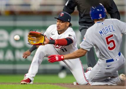 May 12, 2023; Minneapolis, Minnesota, USA; Minnesota Twins second baseman Jorge Polanco (11) gets Chicago Cubs center fielder Christopher Morel (5) out while trying to steal second base in the fifth inning at Target Field. Mandatory Credit: Matt Blewett-USA TODAY Sports