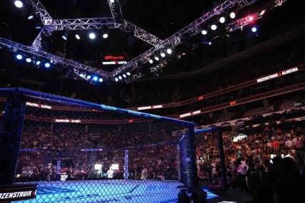 May 13, 2023; Charlotte, North Carolina, USA; The octagon is seen before a heavyweight bout between Jairzinho Rozenstruik (red gloves) and Jailton Almeida  (blue gloves) during UFC Fight Night at Spectrum Center. Mandatory Credit: Jim Dedmon-USA TODAY Sports