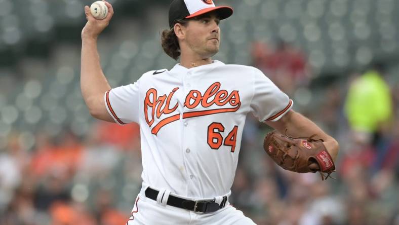 May 16, 2023; Baltimore, Maryland, USA;  Baltimore Orioles starting pitcher Dean Kremer (64) throws a first inning pitch against the Los Angeles Angels at Oriole Park at Camden Yards. Mandatory Credit: Tommy Gilligan-USA TODAY Sports