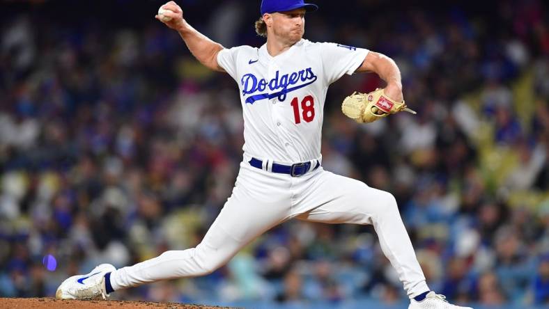 May 16, 2023; Los Angeles, California, USA; Los Angeles Dodgers relief pitcher Shelby Miller (18) throws against the Minnesota Twins during the fifth inning at Dodger Stadium. Mandatory Credit: Gary A. Vasquez-USA TODAY Sports