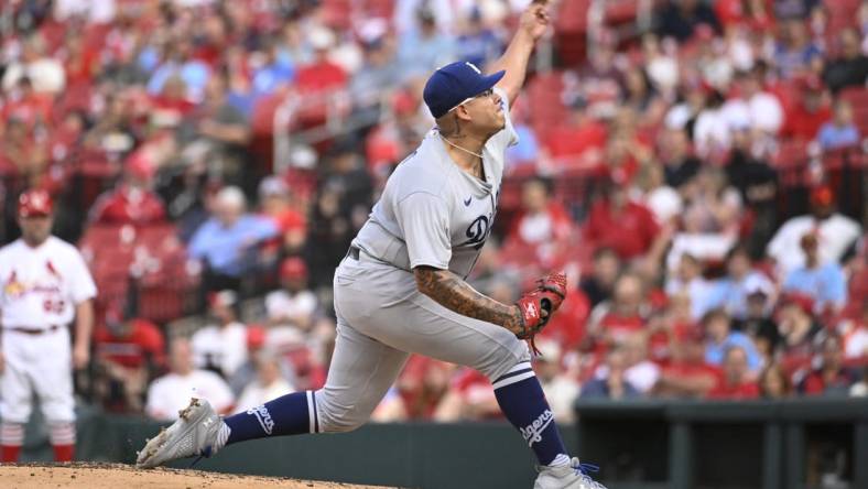 May 18, 2023; St. Louis, Missouri, USA; Los Angeles Dodgers starting pitcher Julio Urias (7) pitches against the St. Louis Cardinals in the first inning at Busch Stadium. Mandatory Credit: Joe Puetz-USA TODAY Sports