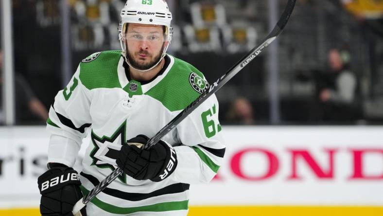 May 19, 2023; Las Vegas, Nevada, USA; Dallas Stars right wing Evgenii Dadonov (63) skates in warm-ups prior to the game against the Vegas Golden Knights in game one of the Western Conference Finals of the 2023 Stanley Cup Playoffs at T-Mobile Arena. Mandatory Credit: Stephen R. Sylvanie-USA TODAY Sports