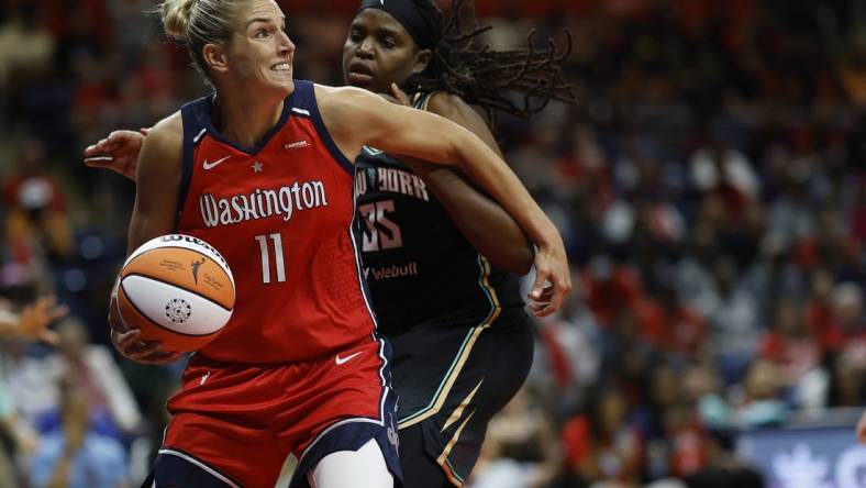 May 19, 2023; Washington, District of Columbia, USA; Washington Mystics forward Elena Delle Donne (11) drives to the basket as New York Liberty forward Jonquel Jones (35) defends in the third quarter at Entertainment & Sports Arena. Mandatory Credit: Geoff Burke-USA TODAY Sports