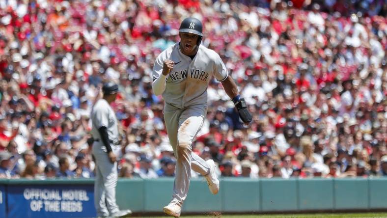 May 21, 2023; Cincinnati, Ohio, USA; New York Yankees pinch runner Greg Allen (30) scores on a double by shortstop Anthony Volpe (not pictured) in the seventh inning against the Cincinnati Reds at Great American Ball Park. Mandatory Credit: Katie Stratman-USA TODAY Sports