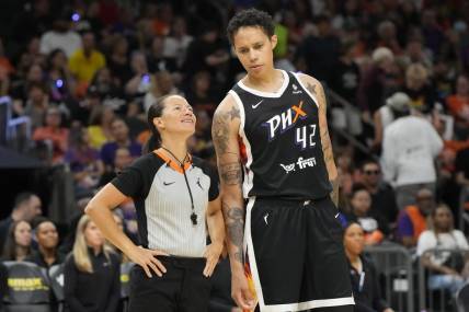 May 21, 2023; Phoenix, Arizona, USA; Phoenix Mercury center Brittney Griner (42) talks to WNBA official Sha'Rae Mitchell in the second half against the Chicago Sky at Footprint Center. Mandatory Credit: Rick Scuteri-USA TODAY Sports