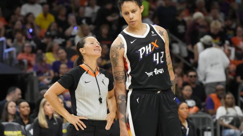 May 21, 2023; Phoenix, Arizona, USA; Phoenix Mercury center Brittney Griner (42) talks to WNBA official Sha'Rae Mitchell in the second half against the Chicago Sky at Footprint Center. Mandatory Credit: Rick Scuteri-USA TODAY Sports