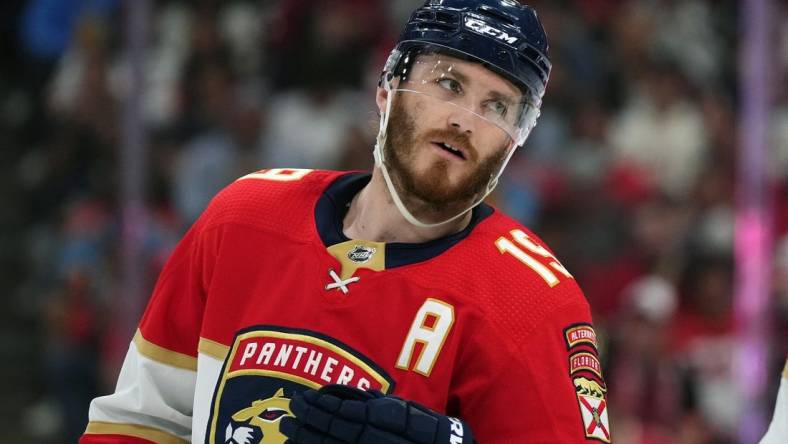 May 22, 2023; Sunrise, Florida, USA; Florida Panthers left wing Matthew Tkachuk (19) skates on the ice against the Carolina Hurricanes during the second period in game three of the Eastern Conference Finals of the 2023 Stanley Cup Playoffs at FLA Live Arena. Mandatory Credit: Jasen Vinlove-USA TODAY Sports