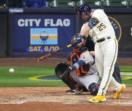 Milwaukee Brewers designated hitter Darin Ruf (25) hits a single during the eighth inning of the game against the Houston Astros Monday, May 22, 2023 at American Family Field in Milwaukee, Wis.