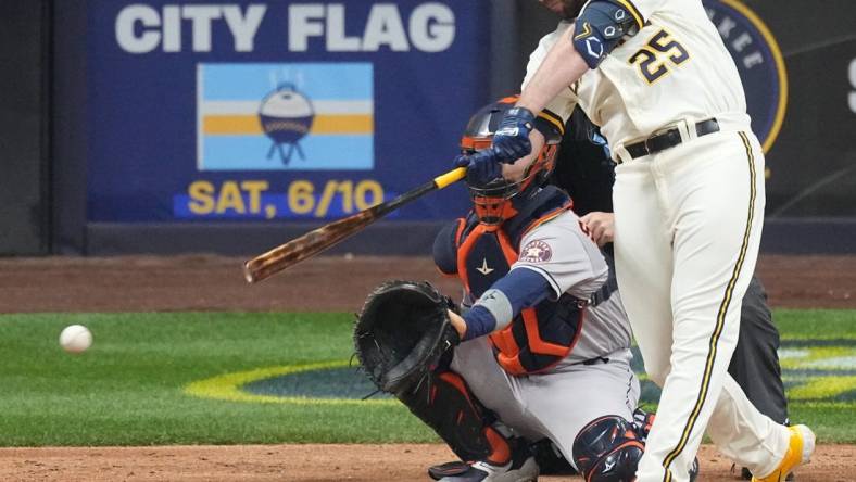 Milwaukee Brewers designated hitter Darin Ruf (25) hits a single during the eighth inning of the game against the Houston Astros Monday, May 22, 2023 at American Family Field in Milwaukee, Wis.