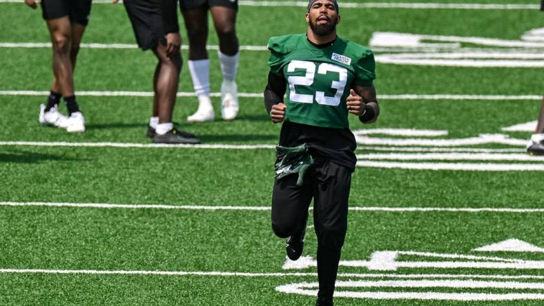 May 23, 2023; Florham Park, NJ, USA; New York Jets safety Chuck Clark (23) warms up during OTA s at Atlantic Health Jets Training Center. Mandatory Credit: Jonathan Jones-USA TODAY Sports