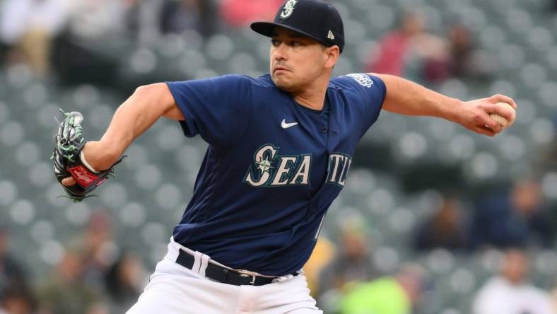 May 23, 2023; Seattle, Washington, USA; Seattle Mariners starting pitcher Marco Gonzales (7) pitches to the Oakland Athletics during the first inning at T-Mobile Park. Mandatory Credit: Steven Bisig-USA TODAY Sports