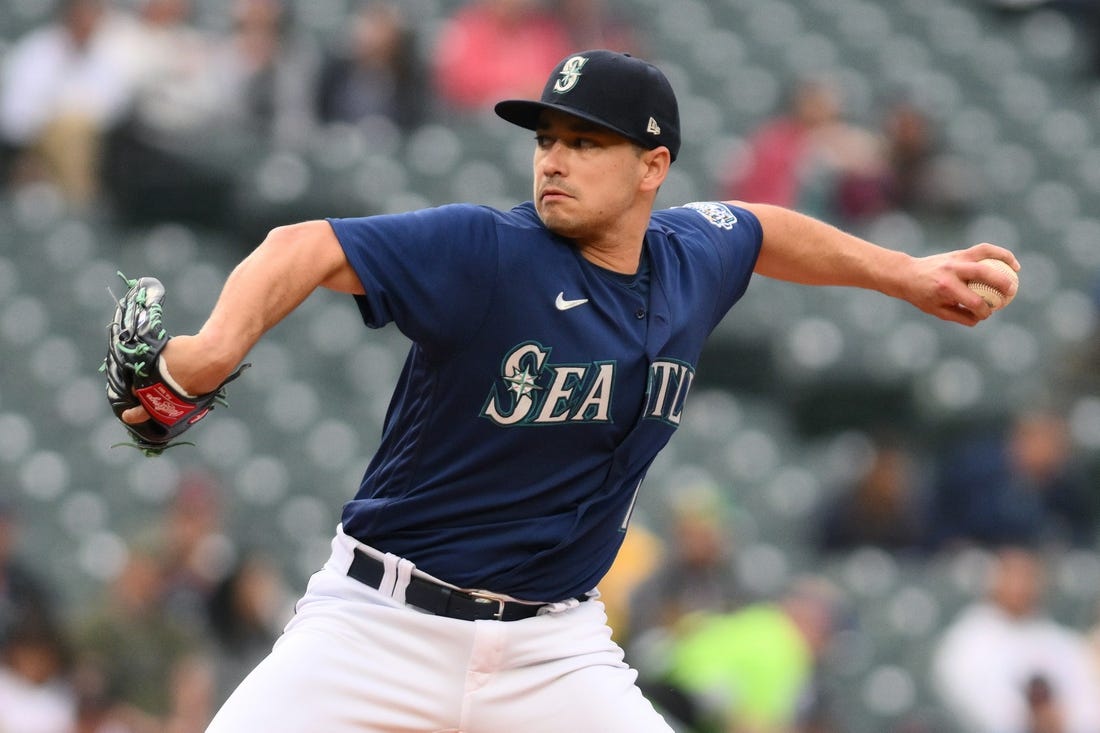 May 23, 2023; Seattle, Washington, USA; Seattle Mariners starting pitcher Marco Gonzales (7) pitches to the Oakland Athletics during the first inning at T-Mobile Park. Mandatory Credit: Steven Bisig-USA TODAY Sports