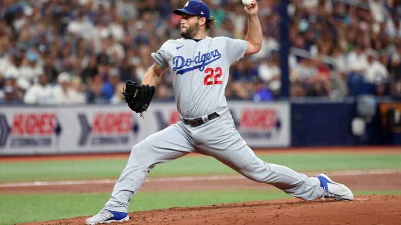 May 27, 2023; St. Petersburg, Florida, USA;  Los Angeles Dodgers starting pitcher Clayton Kershaw (22) throws a pitch during the second inning against the Tampa Bay Rays at Tropicana Field. Mandatory Credit: Kim Klement-USA TODAY Sports