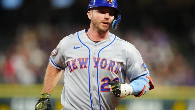 May 27, 2023; Denver, Colorado, USA; New York Mets first baseman Pete Alonso (20) rounds the bases after hitting a solo home run against the Colorado Rockies in the fourth inning at Coors Field. Mandatory Credit: Ron Chenoy-USA TODAY Sports