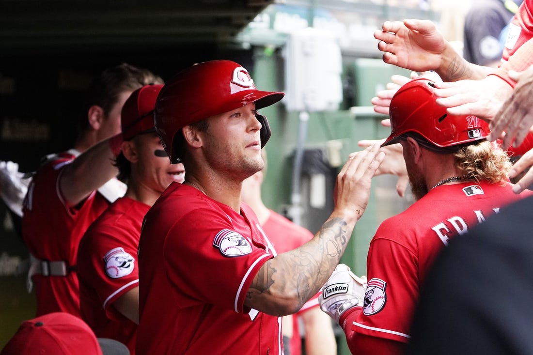 May 28, 2023; Chicago, Illinois, USA; Cincinnati Reds center fielder Nick Senzel (15) after scoring against the Chicago Cubs during the second inning at Wrigley Field. Mandatory Credit: David Banks-USA TODAY Sports