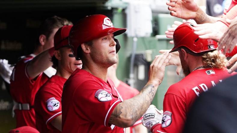 May 28, 2023; Chicago, Illinois, USA; Cincinnati Reds center fielder Nick Senzel (15) after scoring against the Chicago Cubs during the second inning at Wrigley Field. Mandatory Credit: David Banks-USA TODAY Sports