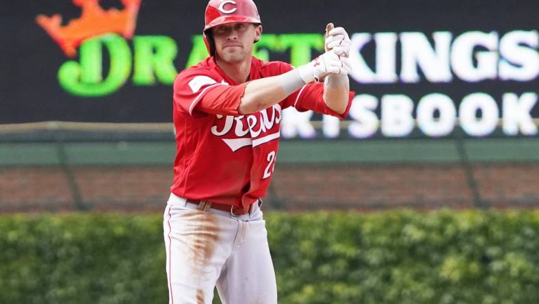 May 28, 2023; Chicago, Illinois, USA; Cincinnati Reds pinch-hitter TJ Friedl (29) gestures after hitting a one-run double against the Chicago Cubs during the fifth inning at Wrigley Field. Mandatory Credit: David Banks-USA TODAY Sports