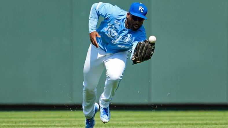 May 28, 2023; Kansas City, Missouri, USA; Kansas City Royals right fielder Jackie Bradley Jr. (41) is unable to make the catch during the eighth inning against the Washington Nationals at Kauffman Stadium. Mandatory Credit: Jay Biggerstaff-USA TODAY Sports