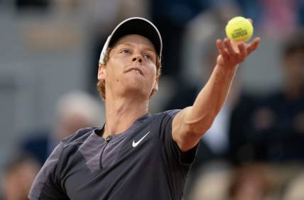 May 29, 2023; Paris,France; Jannik Sinner (ITA) tosses the ball to serve during his match against Alexandre Muller (FRA) on day two at Stade Roland-Garros. Mandatory Credit: Susan Mullane-USA TODAY Sports