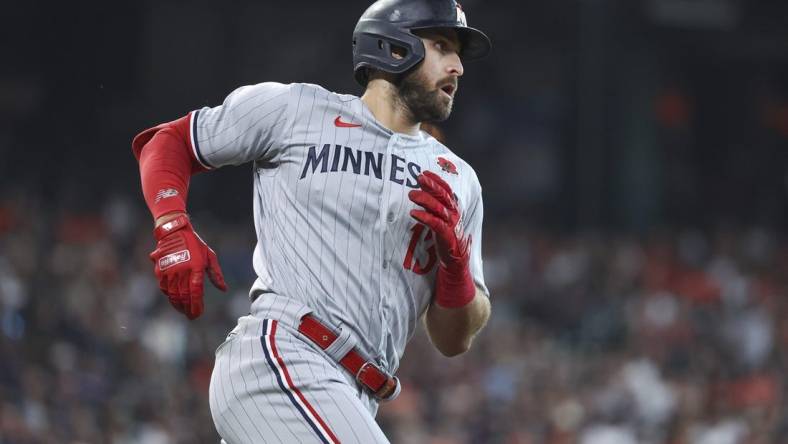 May 29, 2023; Houston, Texas, USA; Minnesota Twins first baseman Joey Gallo (13) runs to first base on a single during the first inning against the Houston Astros at Minute Maid Park. Mandatory Credit: Troy Taormina-USA TODAY Sports