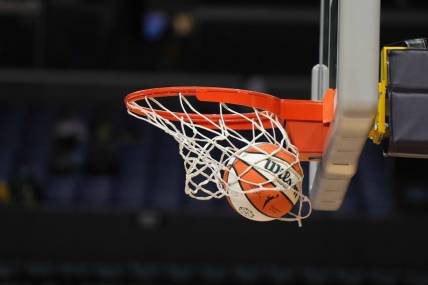 May 25, 2023; Los Angeles, California, USA; Wilson official basketball with WNBA logo goes through the net during the game between the LA Sparks and the Las Vegas Aces at Crypto.com Arena. Mandatory Credit: Kirby Lee-USA TODAY Sports