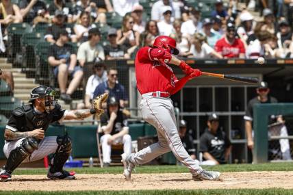May 31, 2023; Chicago, Illinois, USA; Los Angeles Angels first baseman Jared Walsh (20) hits a two-run double against the Chicago White Sox during the third inning at Guaranteed Rate Field. Mandatory Credit: Kamil Krzaczynski-USA TODAY Sports