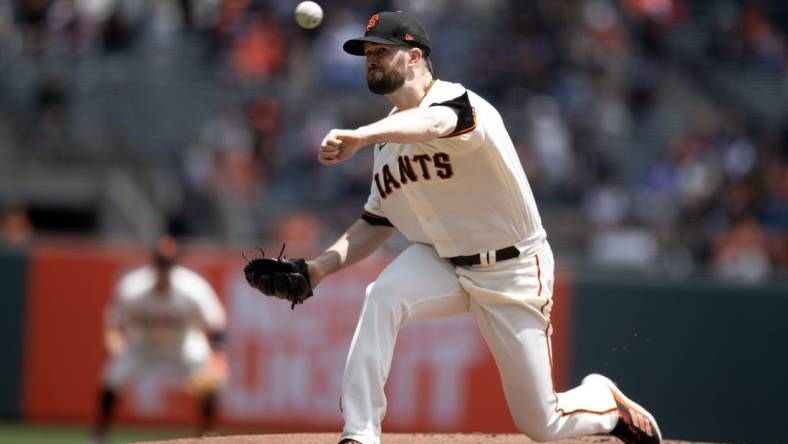 May 31, 2023; San Francisco, California, USA; San Francisco Giants starting pitcher Alex Wood (57) delivers a pitch against the Pittsburgh Pirates during the first inning at Oracle Park. Mandatory Credit: D. Ross Cameron-USA TODAY Sports