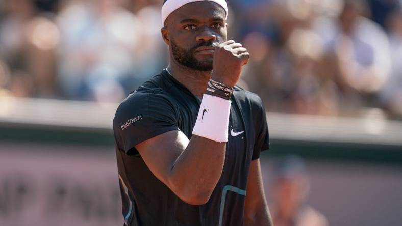 Jun 1, 2023; Paris,France; Frances Tiafoe (USA) reacts to a point during his match against Asian Karatsev on day five at Stade Roland-Garros. Mandatory Credit: Susan Mullane-USA TODAY Sports