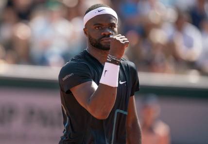 Jun 1, 2023; Paris,France; Frances Tiafoe (USA) reacts to a point during his match against Asian Karatsev on day five at Stade Roland-Garros. Mandatory Credit: Susan Mullane-USA TODAY Sports