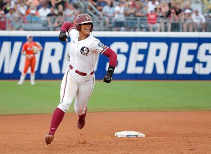 Florida State.'s Michaela Edenfield (51) celebrates a home run in the first inning during a softball game between Oklahoma State Cowgirls and Florida State in the Women's College World Series at USA Softball Hall of Fame Stadium in  in Oklahoma City, Thursday, June, 1, 2023.