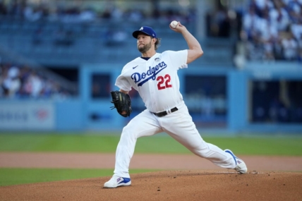 Jun 2, 2023; Los Angeles, California, USA; Los Angeles Dodgers starting pitcher Clayton Kershaw (22) throws in the first inning against the New York Yankees at Dodger Stadium. Mandatory Credit: Kirby Lee-USA TODAY Sports