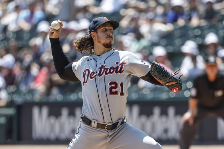Jun 3, 2023; Chicago, Illinois, USA; Detroit Tigers starting pitcher Michael Lorenzen (21) pitches against the Chicago White Sox during the first inning at Guaranteed Rate Field. Mandatory Credit: Kamil Krzaczynski-USA TODAY Sports
