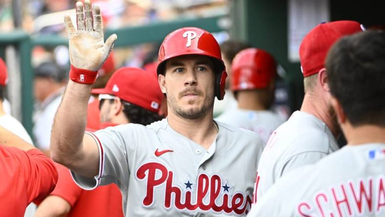 Jun 3, 2023; Washington, District of Columbia, USA; Philadelphia Phillies catcher J.T. Realmuto (10) is congratulated by teammates after hitting a home run against the Washington Nationals during the sixth inning at Nationals Park. Mandatory Credit: Brad Mills-USA TODAY Sports