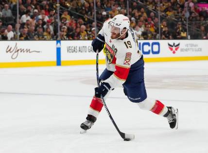 Jun 3, 2023; Las Vegas, Nevada, USA; Florida Panthers left wing Matthew Tkachuk (19) takes a shot against the Florida Panthers during the first period in game one of the 2023 Stanley Cup Final at T-Mobile Arena. Mandatory Credit: Stephen R. Sylvanie-USA TODAY Sports