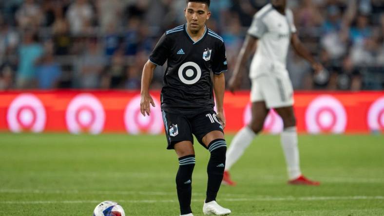 Jun 3, 2023; Saint Paul, Minnesota, USA; Minnesota United midfielder Emanuel Reynoso (10) returns to the team against Toronto FC in the second half at Allianz Field. Mandatory Credit: Matt Blewett-USA TODAY Sports