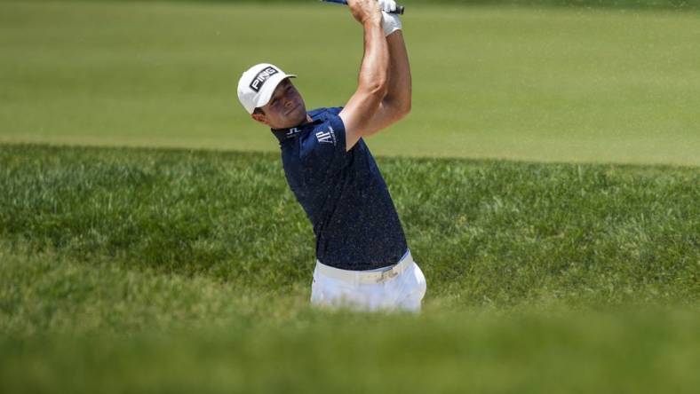 Jun 4, 2023; Dublin, Ohio, USA; Viktor Hovland hits from a bunker on the first fairway during the final round of the Memorial Tournament golf tournament at the Muirfield Village Golf Club. Mandatory Credit: Aaron Doster-USA TODAY Sports