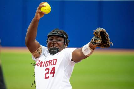 Stanford starting pitcher NiJaree Canady (24) pitches during a softball game between Stanford and Washington at the Women's College World Series at USA Softball Hall of Fame Stadium in in Oklahoma City on Sunday, June 4, 2023.