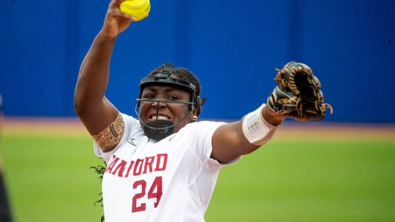 Stanford starting pitcher NiJaree Canady (24) pitches during a softball game between Stanford and Washington at the Women's College World Series at USA Softball Hall of Fame Stadium in in Oklahoma City on Sunday, June 4, 2023.