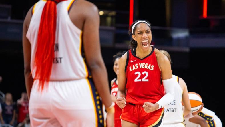 Jun 4, 2023; Indianapolis, Indiana, USA; Las Vegas Aces forward A'ja Wilson (22) celebrates the win against the Indiana Fever  at Gainbridge Fieldhouse. Mandatory Credit: Trevor Ruszkowski-USA TODAY Sports