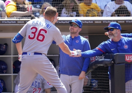 Jun 4, 2023; San Diego, California, USA;  Chicago Cubs first baseman Trey Mancini (36) is congratulated by manager David Ross (3) after hitting a solo home run against the San Diego Padres during the second inning at Petco Park. Mandatory Credit: Ray Acevedo-USA TODAY Sports