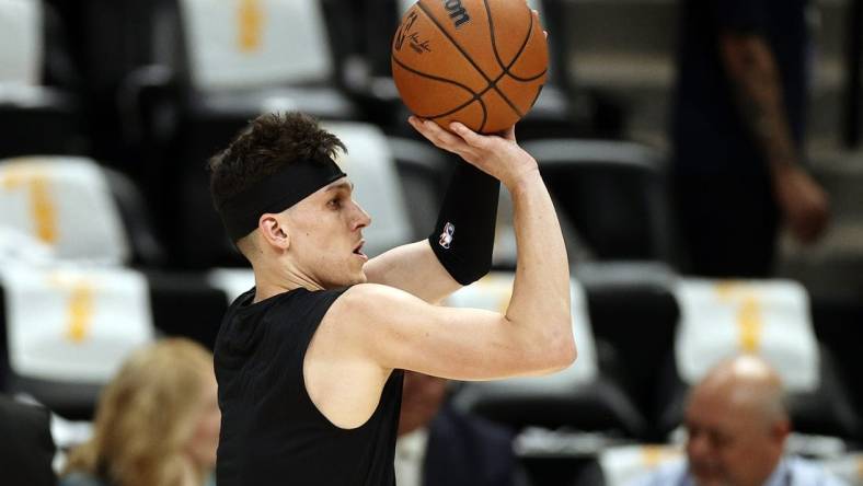 Jun 4, 2023; Denver, CO, USA; Miami Heat guard Tyler Herro (14) warms up before game two against the Denver Nuggets in the 2023 NBA Finals at Ball Arena. Mandatory Credit: Isaiah J. Downing-USA TODAY Sports