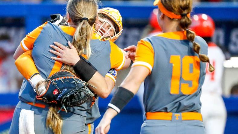 Tennessee players celebrate after winning a softball game between Oklahoma State (OSU) and Tennessee at the Women's College World Series at USA Softball Hall of Fame Stadium in in Oklahoma City on Sunday, June 4, 2023.