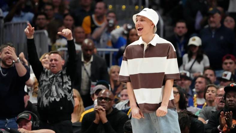 Jun 4, 2023; Denver, CO, USA; Miami Heat guard Tyler Herro (14) reacts after a play against the Denver Nuggets during the fourth quarter in game two of the 2023 NBA Finals at Ball Arena. Mandatory Credit: Kyle Terada-USA TODAY Sports