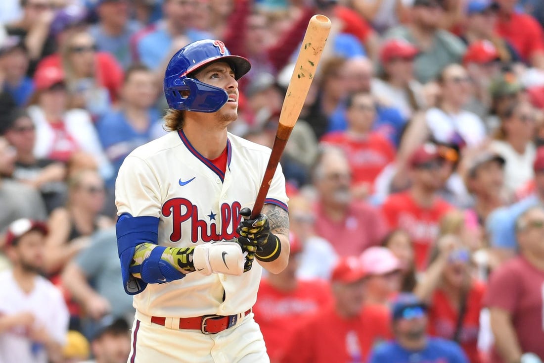 Harper hits grand slam in 9th, Phillies rally past Cubs 7-5