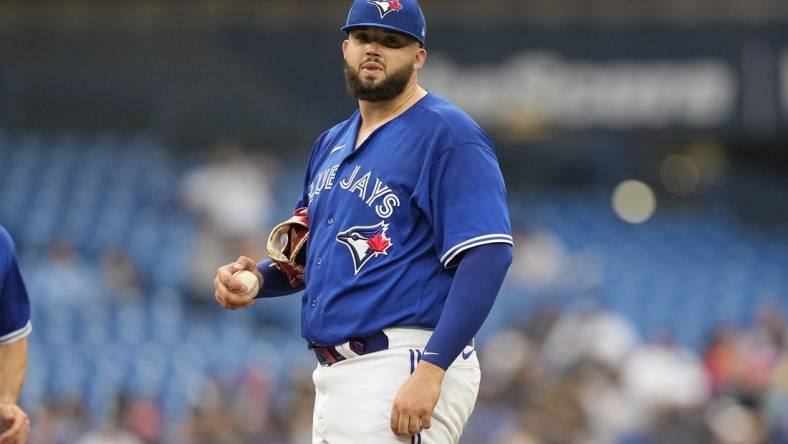 Jun 5, 2023; Toronto, Ontario, CAN; Toronto Blue Jays starting pitcher Alek Manoah (6) reacts before getting pulled from the game during the first inning against the Houston Astros at Rogers Centre. Mandatory Credit: John E. Sokolowski-USA TODAY Sports