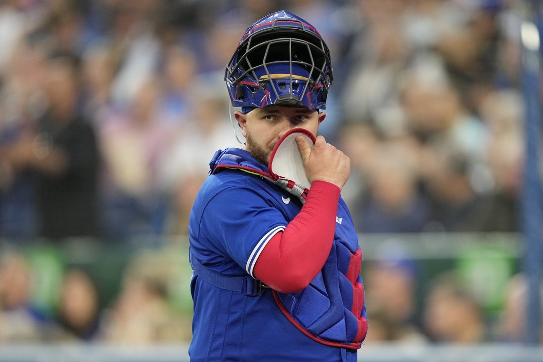 Jun 5, 2023; Toronto, Ontario, CAN; Toronto Blue Jays catcher Alejandro Kirk (30) walks to the dugout at the end of the fourth inning against the Houston Astros at Rogers Centre. Mandatory Credit: John E. Sokolowski-USA TODAY Sports