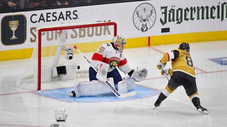 Jun 5, 2023; Las Vegas, Nevada, USA; Vegas Golden Knights right wing Jonathan Marchessault (81) scores gaol on Florida Panthers goaltender Alex Lyon (34) in the third period in game two of the 2023 Stanley Cup Final at T-Mobile Arena. Mandatory Credit: Gary A. Vasquez-USA TODAY Sports